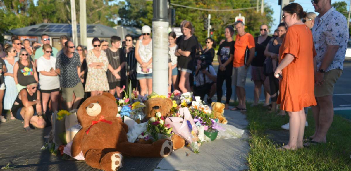 MOURNING: A candelight vigil was held at the crash site on Wednesday evening.