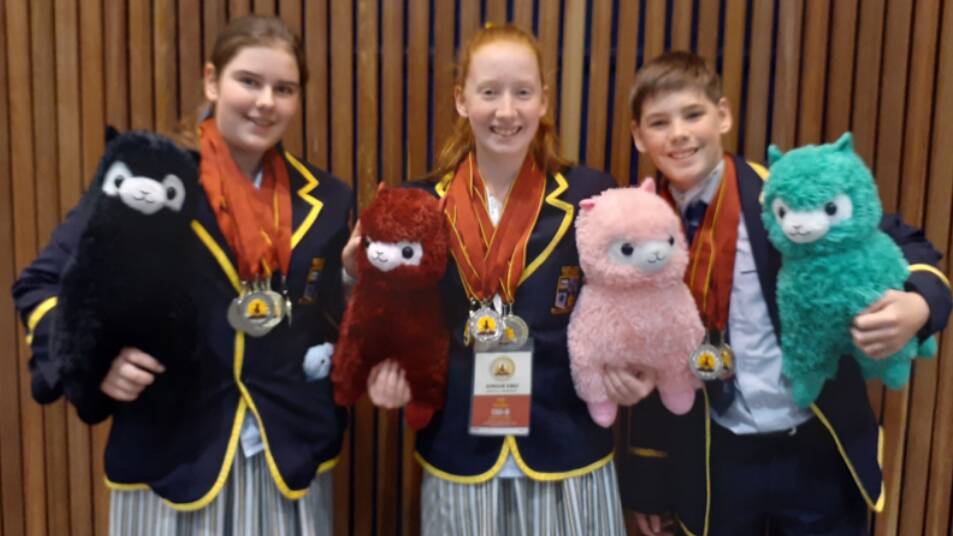 QUALIFIERS: Isla Souter, Delicia Walker and Noah Souter at the World Scholar's Cup Global Round in Sydney.