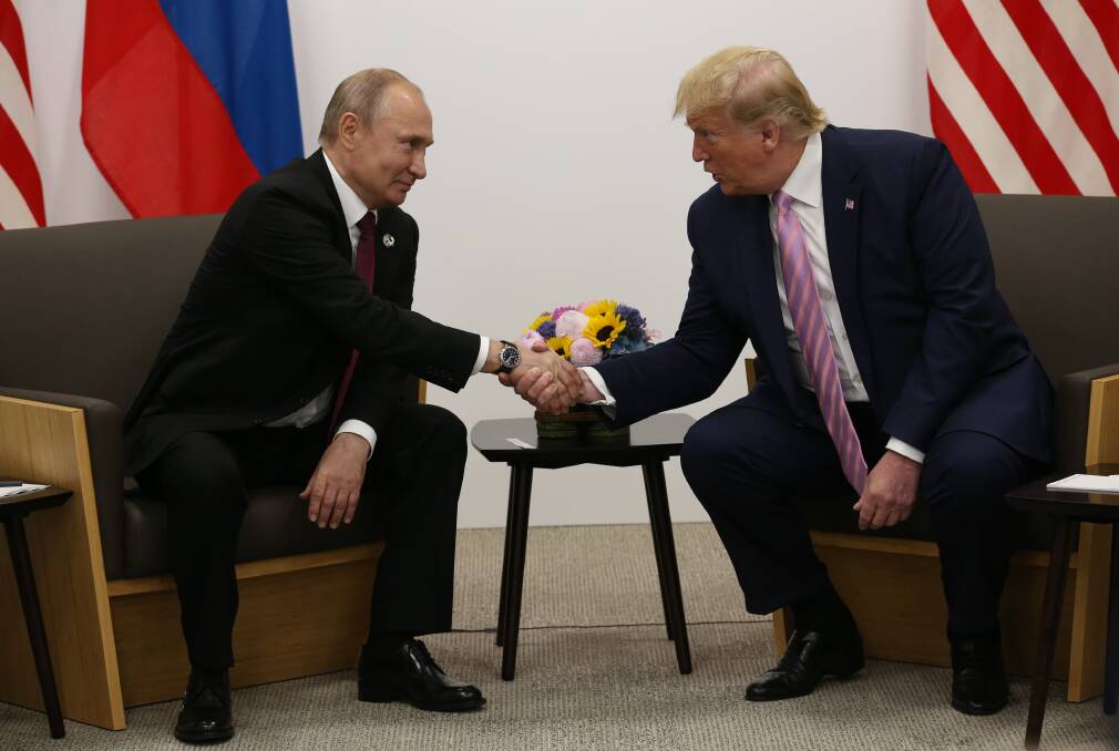 Strongmen united - Vladimir Putin and Donald Trump at the G20 summit in Osaka, Japan, 2019. Picture: Getty Images