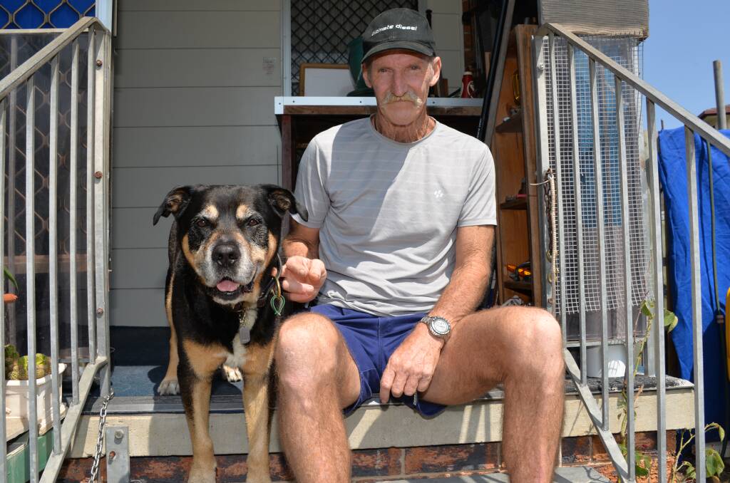 CRANKY RESIDENT: Alexandra Hills resident Allen Murray with his dog Blake. Mr Murray says Redland City Council does not police its own laws regarding domestic pets.