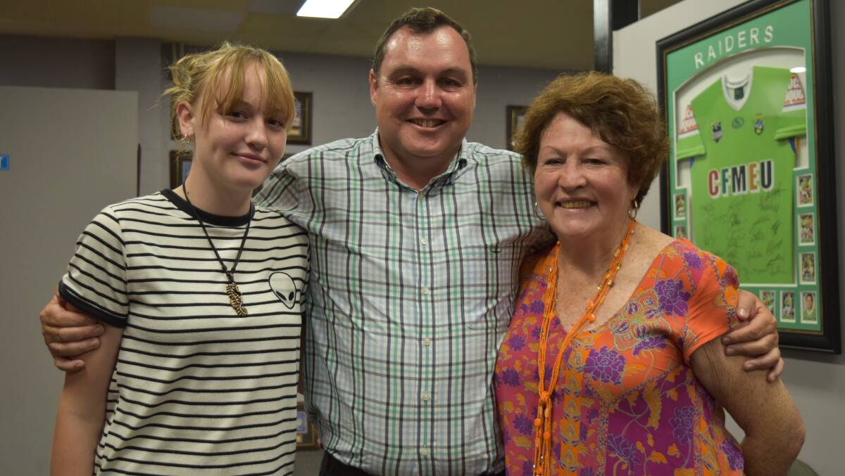 COUNT ON: Redlands MP Matt McEachan with his daughter India, 13, and mother Carolyn Cook at his election night party at Redlands Rugby League Club. Photo: Hannah Baker