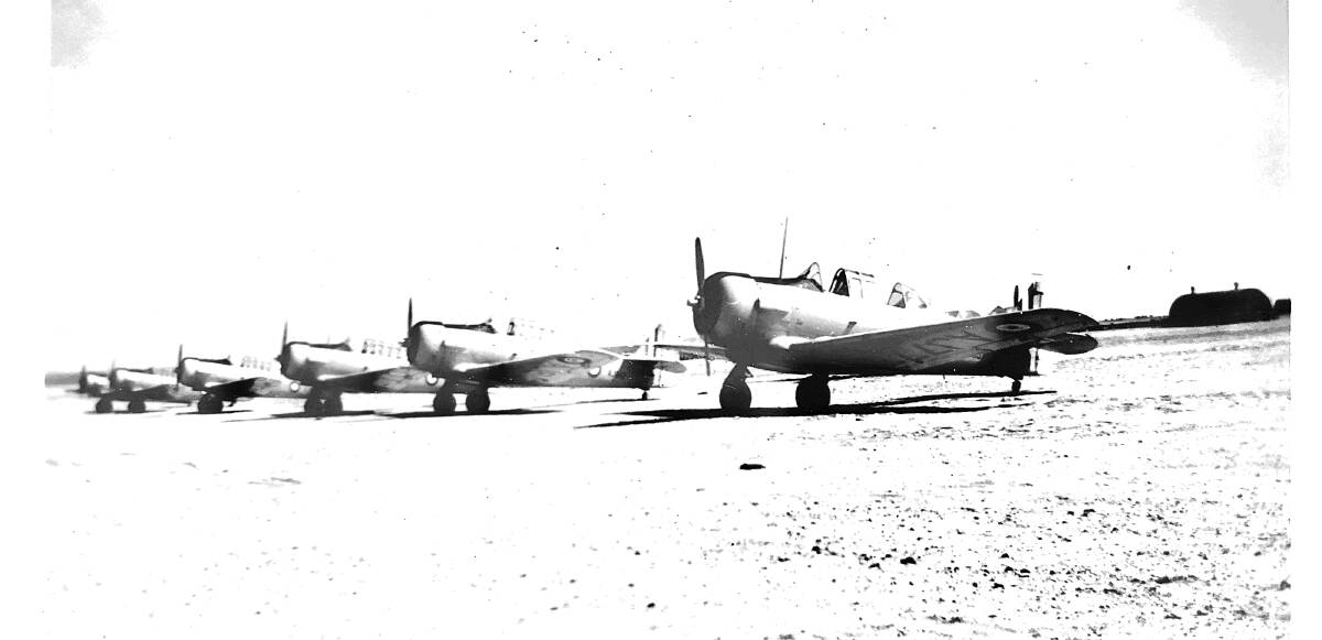 AT WAR: Aircraft parked in at a desert airfield in North Africa during WWII.