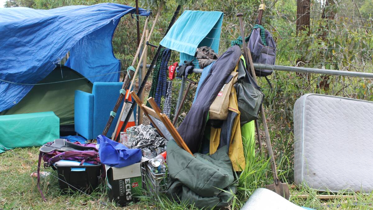 NOWHERE TO LIVE: Belongings stacked at the Capalaba site.