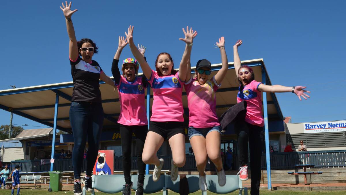 PINK FUN: Capalaba FC girls Sharon McAney, Kylie Gibson, Taylah McAney, Shani Gibson and Cherilyn Hein leap into Pink Weekend. The Bulldogs club will raise funds for cancer charities next week.