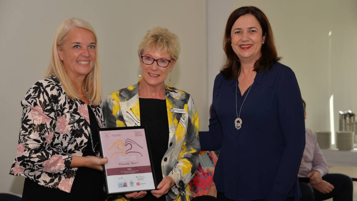 AWARD: Debra Barker, president of Redlands U3A, with Redlands MP Kim Richards and Premier Annastacia Palaszczuk.
