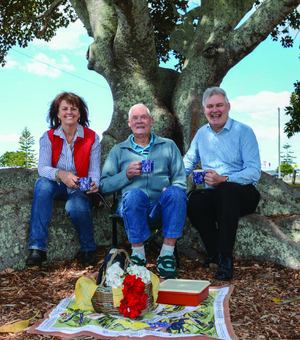 PICNIC PLACE: Wendy Boglary enjoy the fig tree ambience with locals Boyd and Peter Gammie. Boyd is the same age as the trees, 90.
