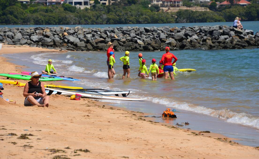 RABY BAY: Lifesavers in training ... the nippers get wet.