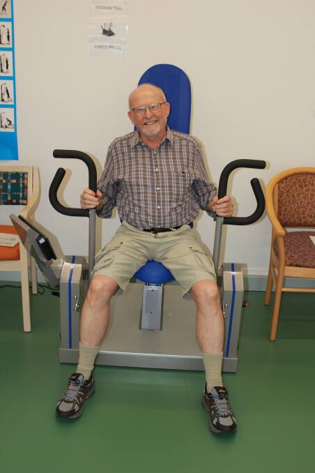 PUMP IT: Moreton Shores retirement living resident Geoff Miles works out in the new on-site gym.