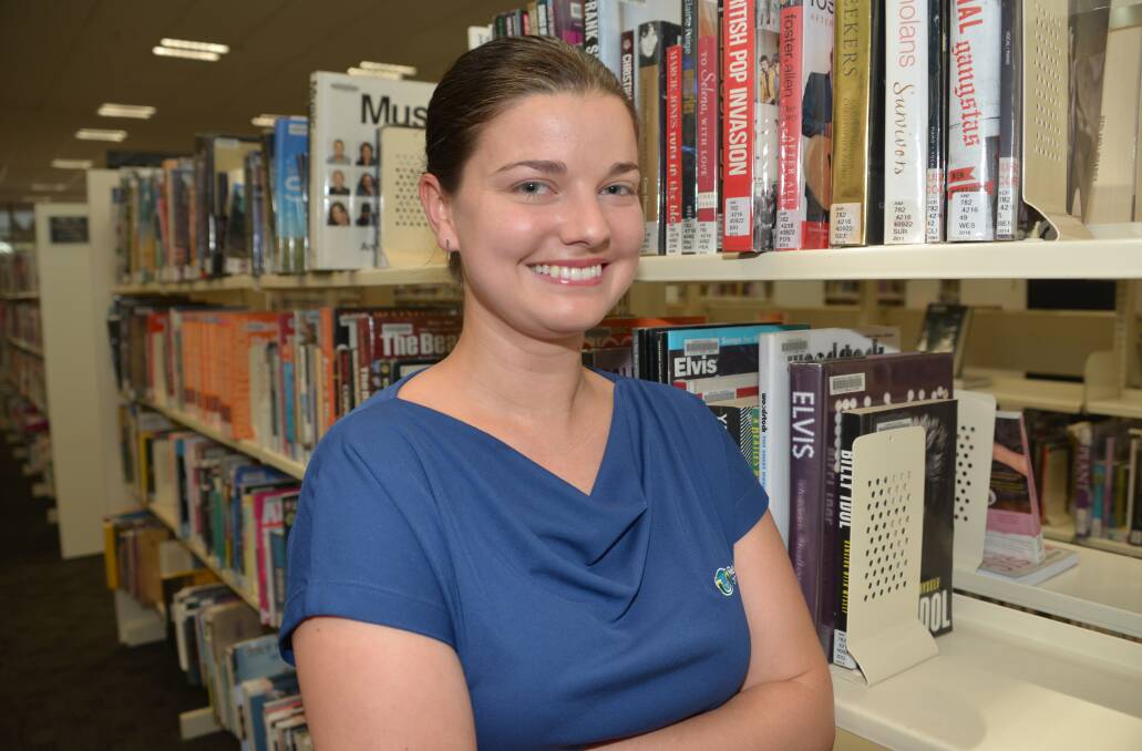 CHANGING TIMES: Library assistant Tessa Paggiaro at Cleveland library. Library staff are changing how libraries operate, broadening services to the community.