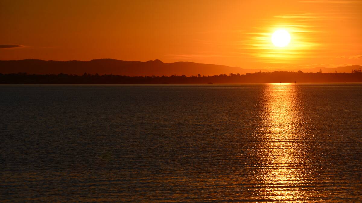 END OF DAY: Ah, a Moreton Bay sunset. It's hard to beat across the water.