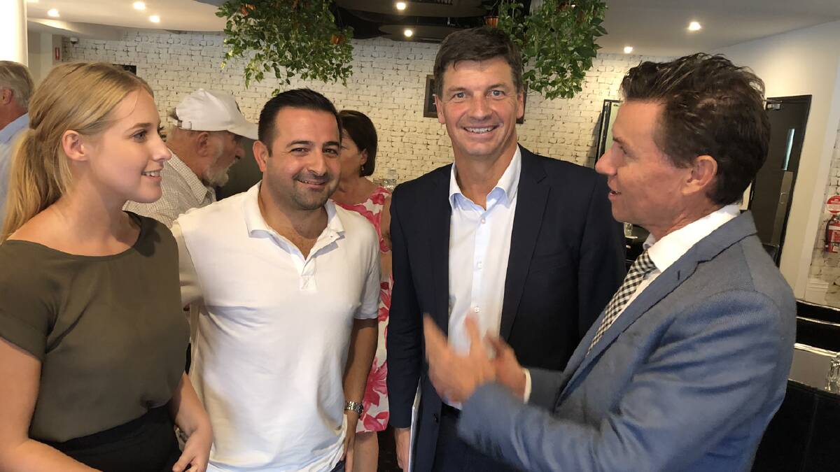 CHAT: The people in the photo are Georgie Saunders and Paul Habib talk with Energy Minister Angus Taylor and Bowman MP Andrew Laming.