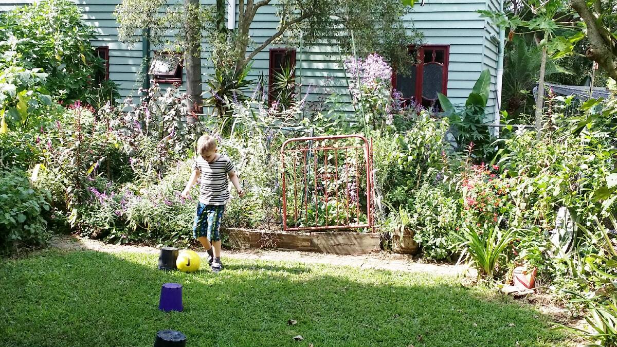 GOOD PLACE: Kate Wall's beautiful organic garden is a good place to hang out.