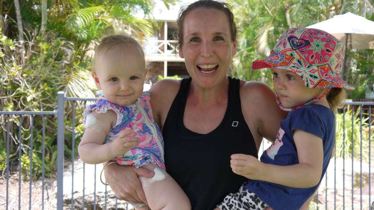 RARIN' TO GO: Hayley with daughters Sienna, 1, and Harper, 2, before the start of the challenge.