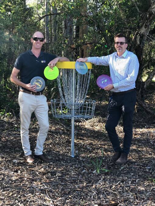 PLAY TIME: Disc players Dale McFarlane and Gavin Cowan with the discs and baskets.