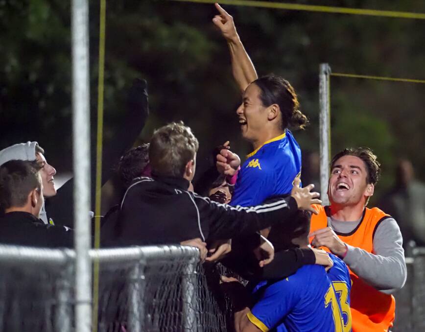 CELEBRATIONS: Ryo Ono, fans and team members celebrate the victory. A match up with district rivals Redlands looms.