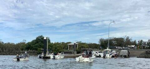 PATIENCE NEEDED: Boaties line up to bring boats in at a busy ramp. Ramps at places like Cleveland and Victoria points are becoming exceedingly busy as a relatively wealthy population buys into boating.