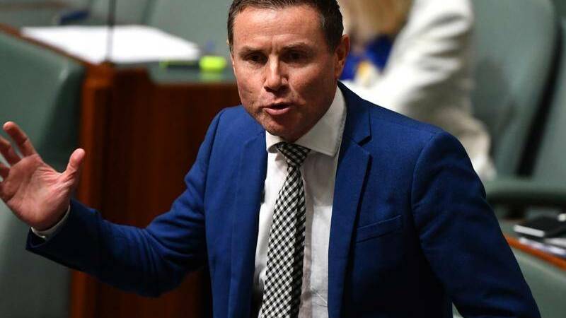 CLEARED: MP Andrew Laming has been cleared by police of allegations of taking an inappropriate photograph of a woman bending over.
