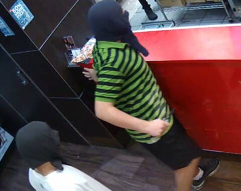 ROBBERY UNDER WAY: This is CCTV footage of an armed robbery by two men at Capalaba last night.