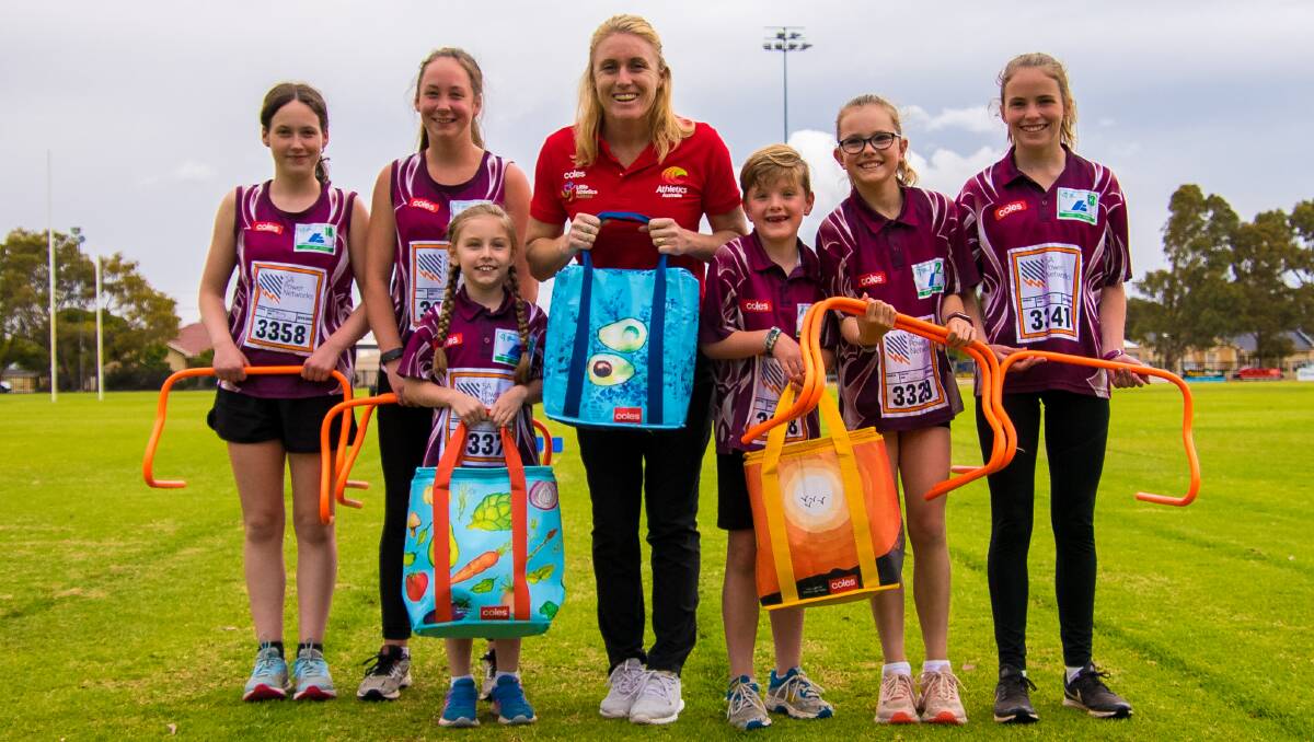 FAST WORK: Athlete Sally Pearson with some little athletes and chiller bags.