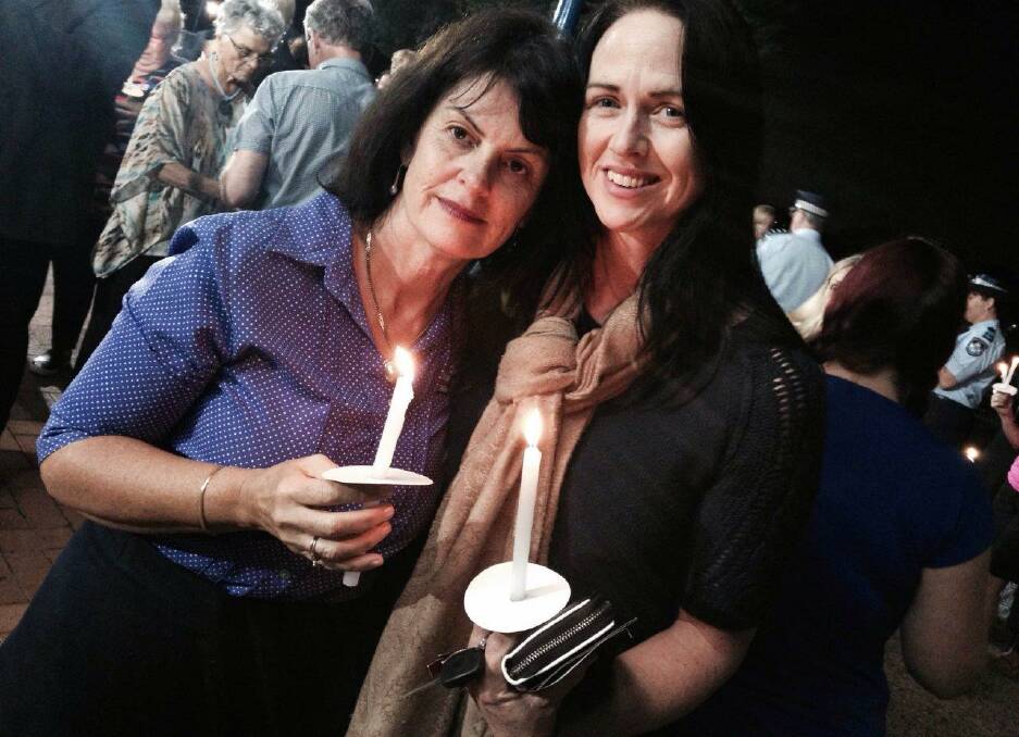 candle vigil: Cr Wendy Boglary and Janine Healy.