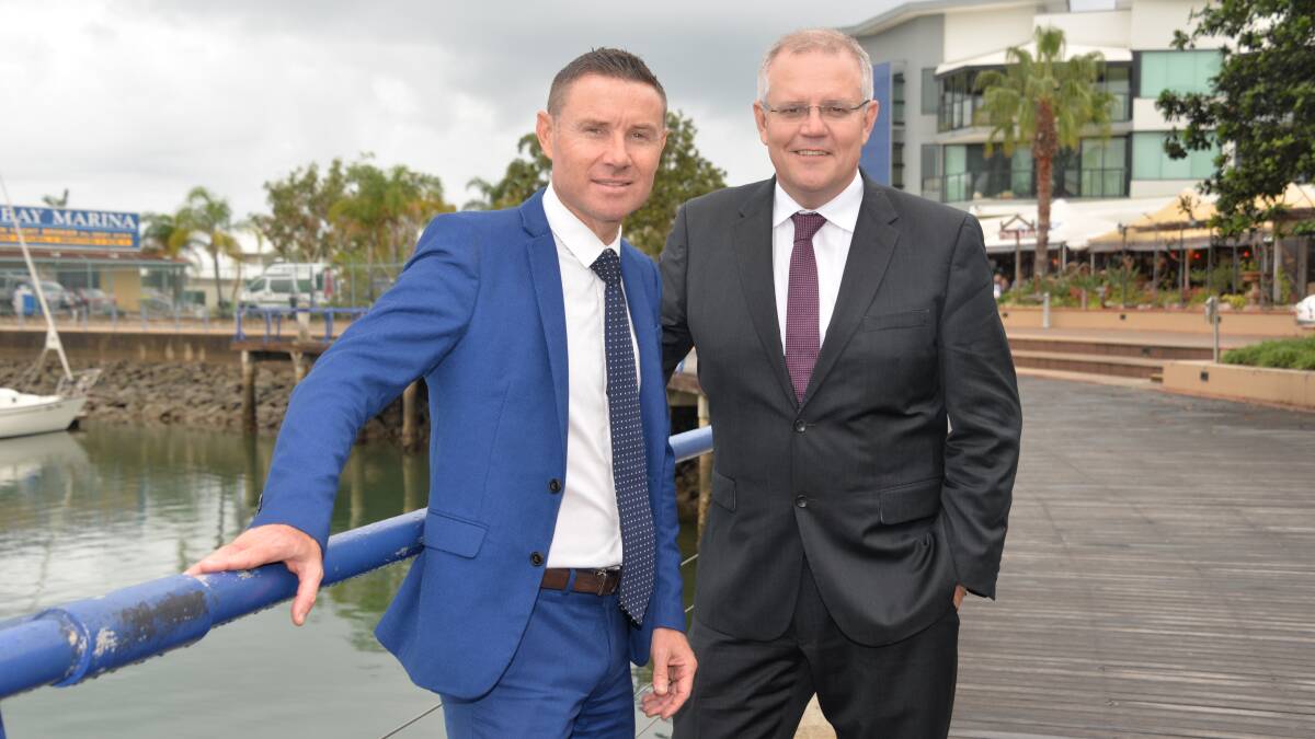 AUDIT: MP Andrew Laming and Prime Minister Scott Morrison at Raby Bay. Concerns have been raised about an auditor's report into government distribution of taxpayer funds.
