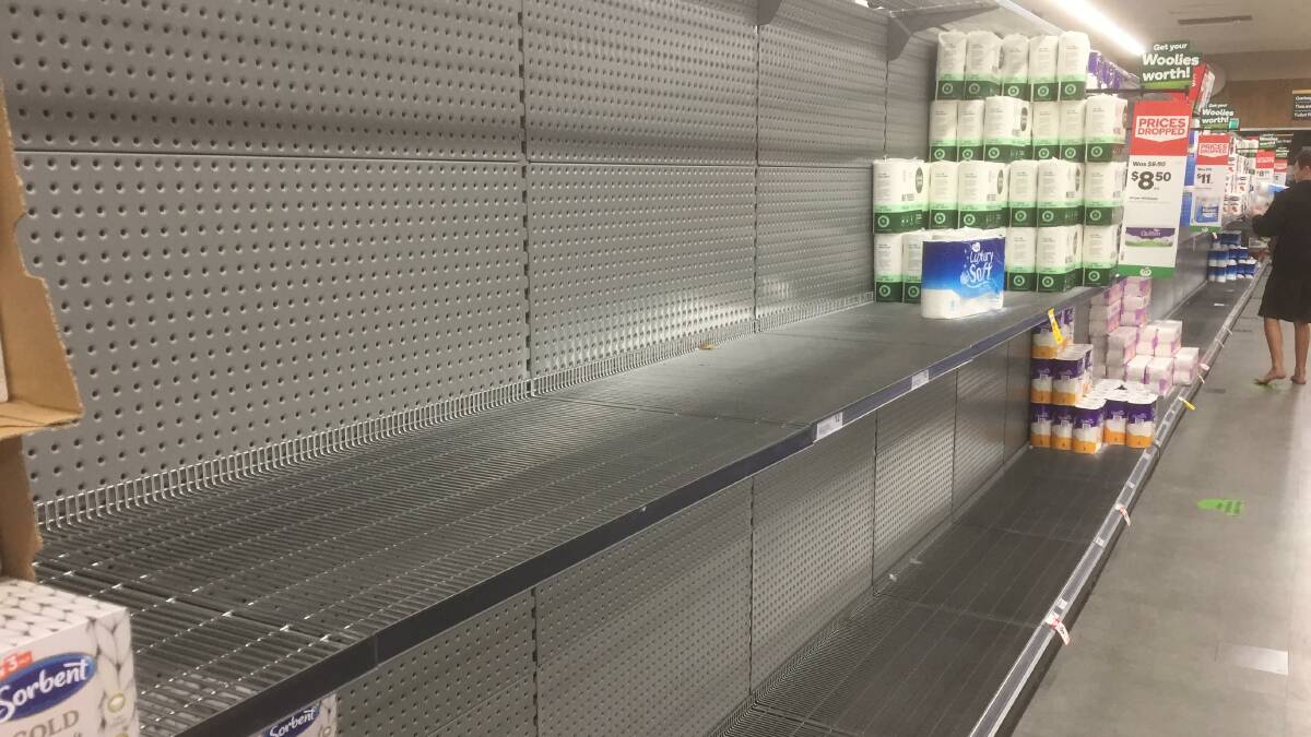 BUMMER OF AN ISSUE: Shoppers were keen on toilet paper at Alexandra Hills Woolworths Saturday, August 1. Photo: Brian Williams