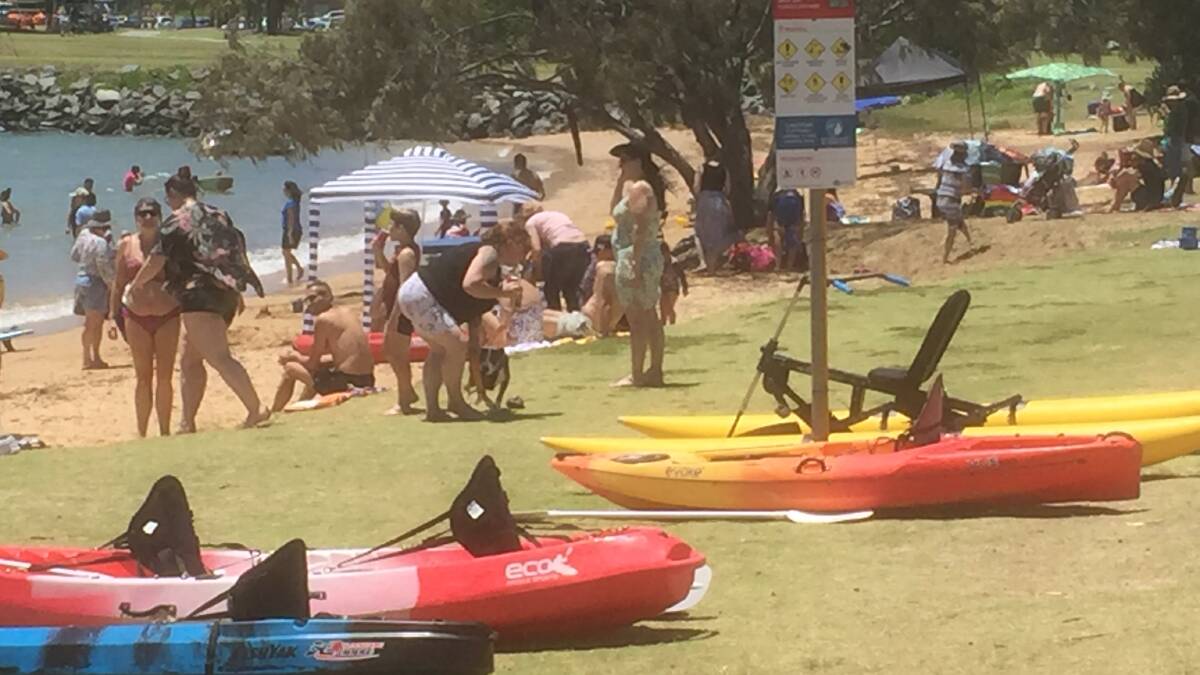 CROWDED: Raby Bay on Saturday morning, with equipment for rent in the foreground. Part of the park is already used by a kayak rental and coffee outlet, providing a handy service to beach users.