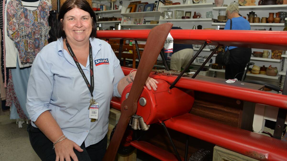 TAKING OFF: Cleveland Salvos manager Dana Dorrington with aviation-themed shelving for a child's room.