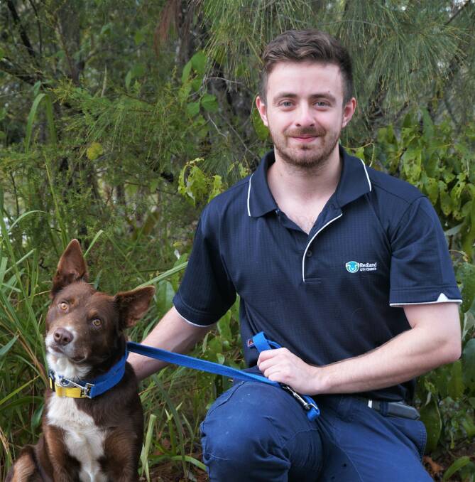 DAN AND RED: Animal shelter officer Daniel Watts with Red, the Australian Kelpie which is up for adoption.