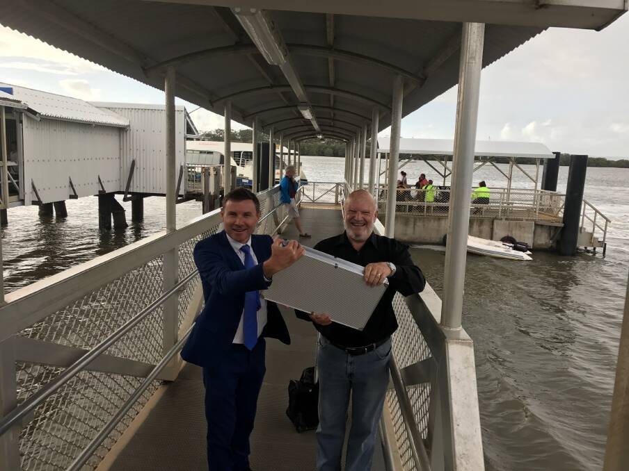CAMERAS: Bowman MP Andrew Laming and Bay Islands Chamber of Commerce vice-president Colin McInnes with some of the CCTV equipment to be installed at bay island jetties.