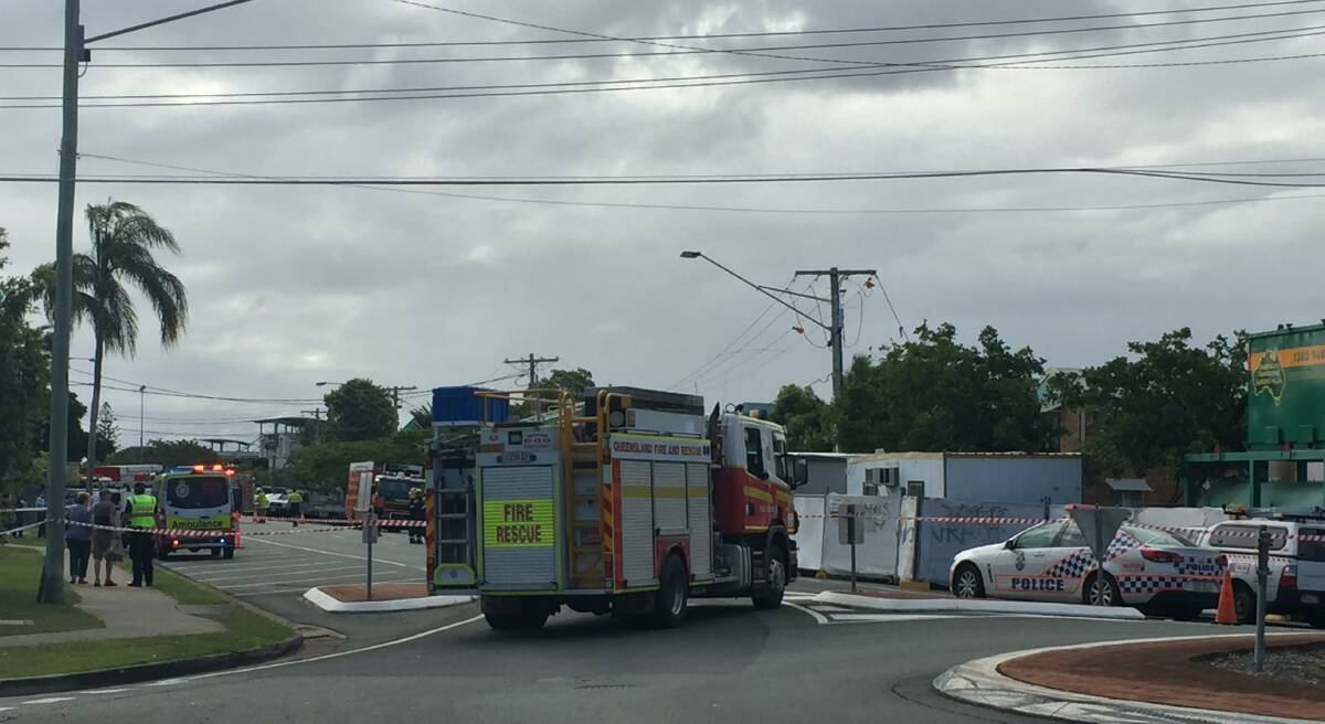 DAMAGE SUSPECTED: Police and QFES staff close off Middle Street, Cleveland, today. Photo: Lyn Uhlmann