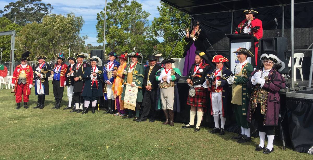 The town criers get together at RedFest.