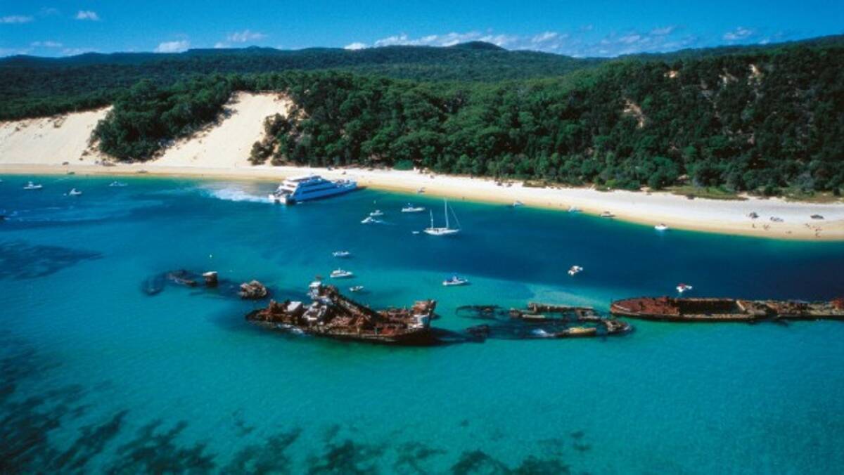 MORETON ISLAND: The anchorage near Tangalooma with a barge coming. 