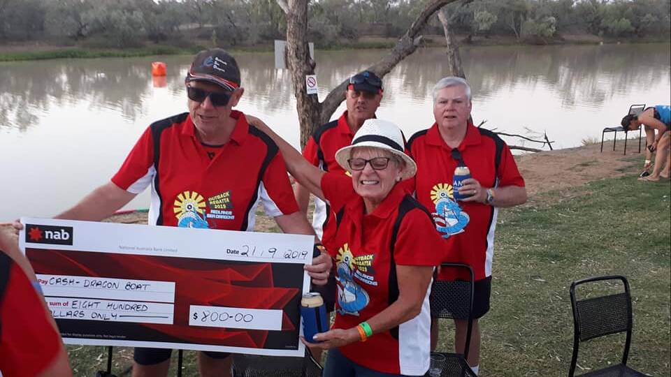HERE'S CHEERS: The Redlands team picked up the $800 cheque and brought plenty of cheer to drought-hit Longreach.