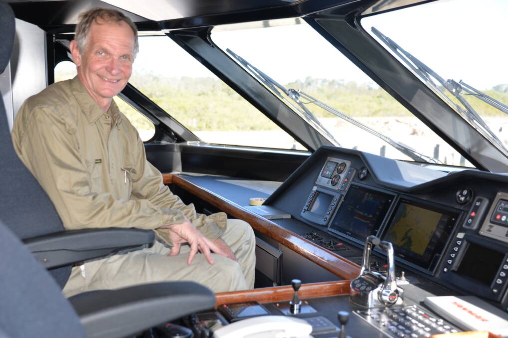 TOP JOB: Company owner and boat builder Steve Cordingley on the bridge of the 300-passenger fast cat.