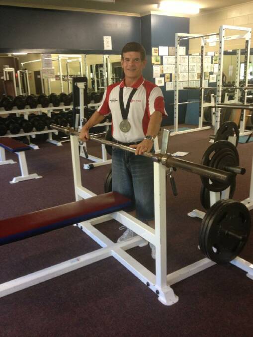 WORK OUT: Ormiston coach Kevin Rogers ... pumping iron for more than 22 years.