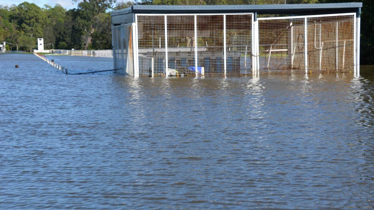 WET TRACK: This is the Capalaba greyhound track when ex-Cyclone Debbie inundated the area as Leslie Harrison Dam overflowed.