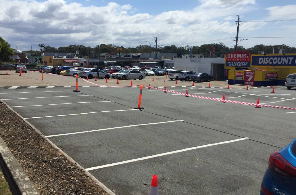 PREPERATION: The car park behind Chemist Warehouse at Capalaba was roped off ready for Young Rock film crews. Photo: Jordan Crick