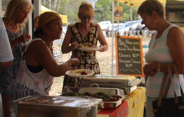 BUSHFIRE RELIEF: More than $12,500 was raised at fundraising events organised by the Macleay Island Progress Association and Lions Club. Photos: Jules Dwyer. 