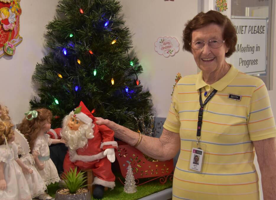 MERRY CHRISTMAS: Betty Wiles' doll display is the talk of the Adventist retirement village at Victoria Point. It features Santa Claus, a Christmas tree and dolls she made in the 1980s and 90s. Photo: Jordan Crick. 
