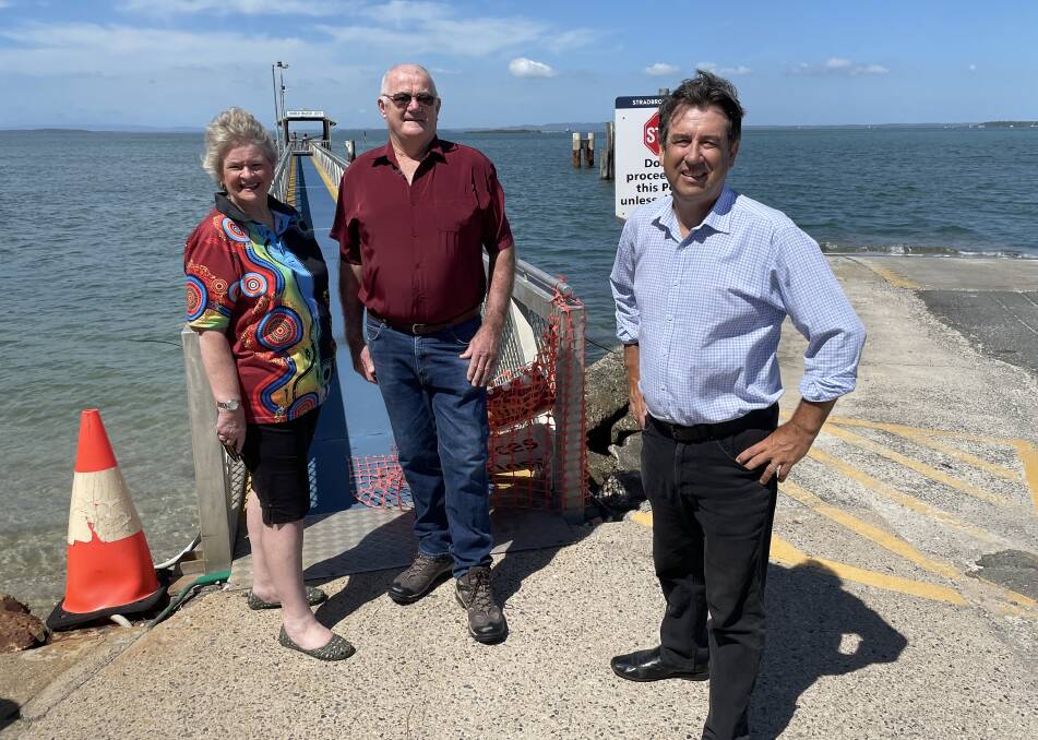 JETTY PROBLEM: Christine and Simon Walker joined with Oodgeroo MP Mark Robinson at the Harold Walker Jetty.