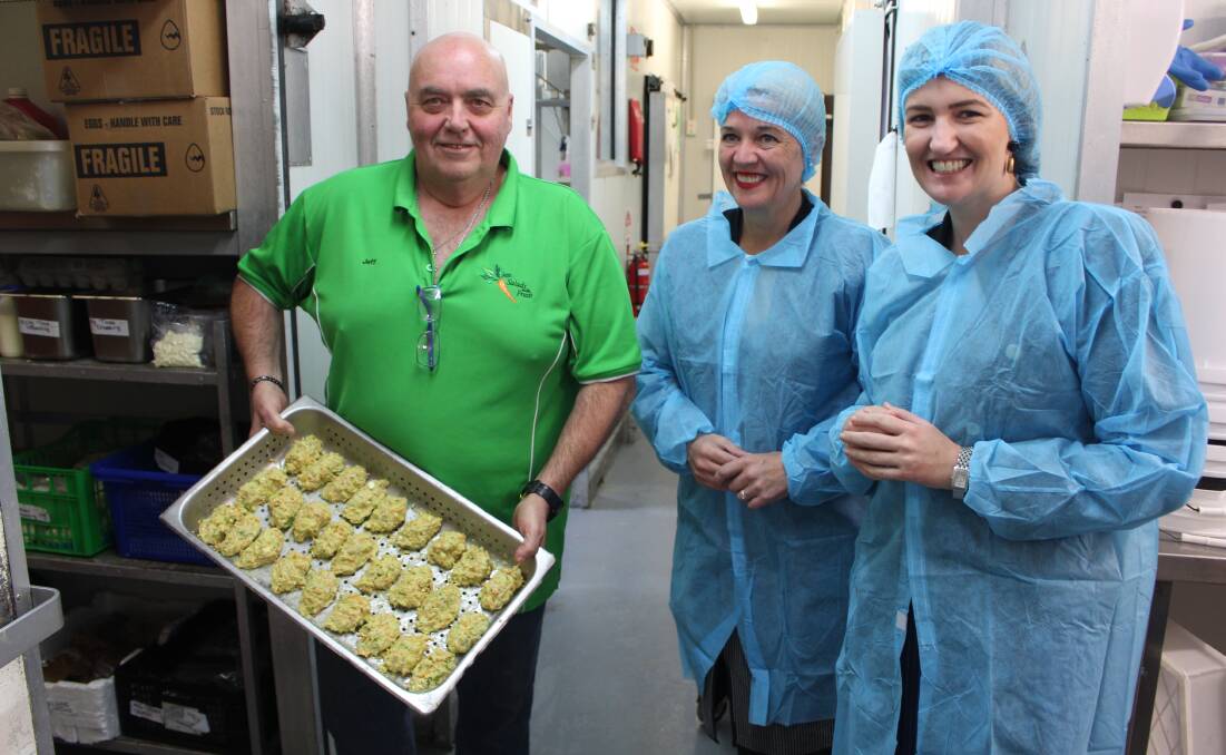 FOOD: Salads Made Fresh owner Jeff McEvoy checks out some of the business' creations with Redlands MP Kim Richards and Employment Minister Shannon Fentiman. Photo: Jordan Crick
