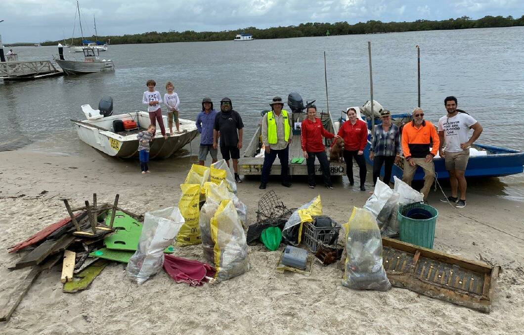 RUBBISH COLLECTION: Moreton Bay oyster farmers were involved in a mass clean up last year. Photo: supplied