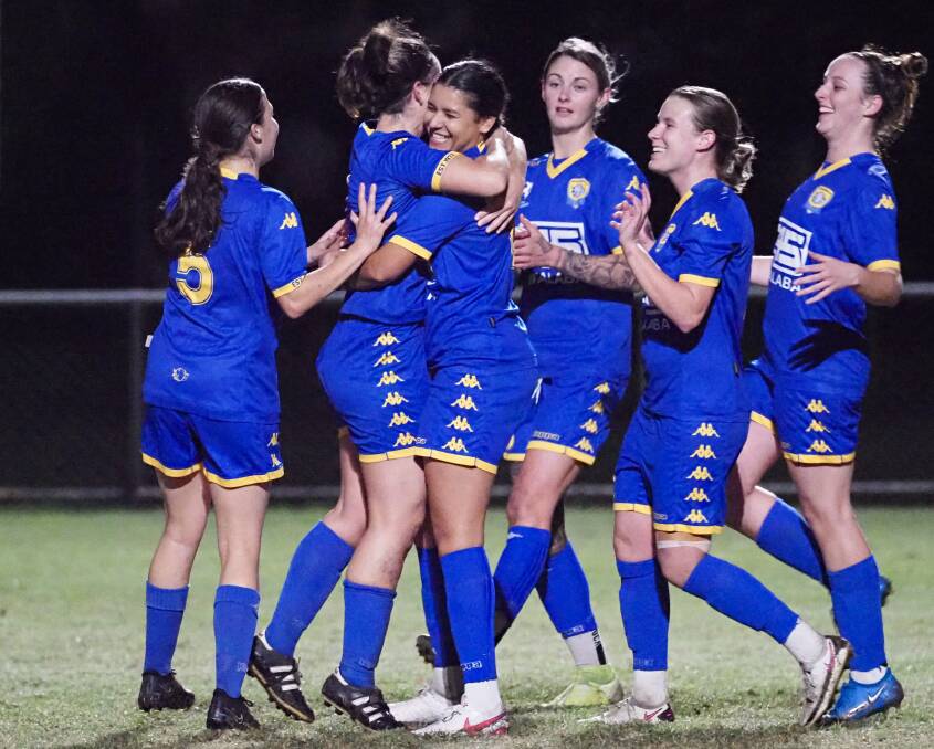 RED HOT: The Capalaba Bulldogs women's team celebrate a goal against the Ipswich-based Western Pride. Photo: Alan Minifie/Capalaba FC 