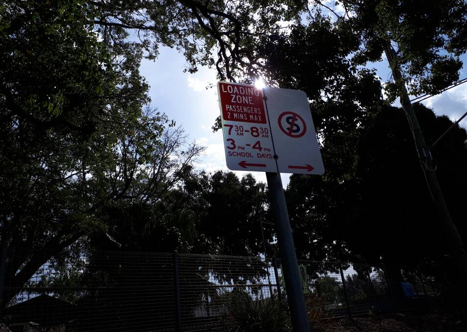 PARKING DEBACLE: The new loading zone sign outside Redland Bay State School. Photo: Tony Philpot. 