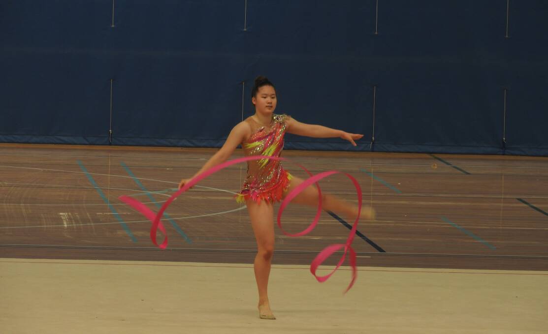 GRACEFUL: Aileen Chiang performs in a ribbon event at the Caloundra-based state titles held in December. 
