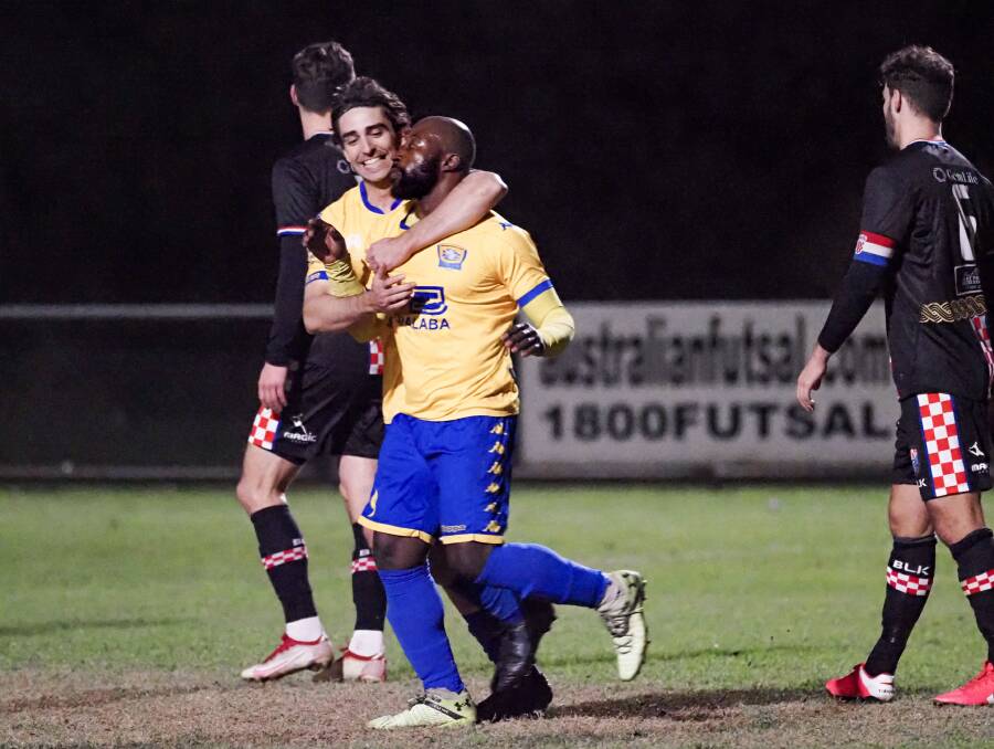 STRIKE POWER: Kado Aoci and Yianni Kondilis celebrate a goal during Capalaba's triumph over Gold Coast Knights. Photo: Alan Minifie/Capalaba FC