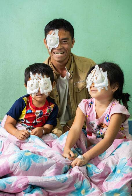 SIGHT: Poorlee and his children Shoua and Blong after their eye operation. 