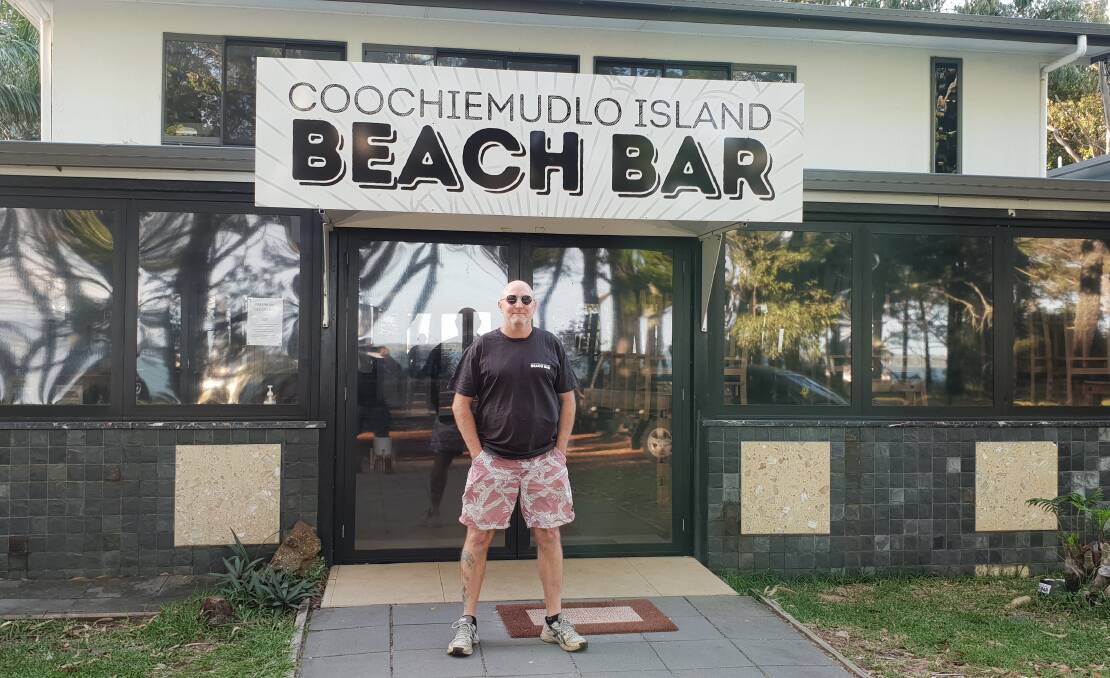 BUSINESS BATTLE: Kevin McCarthy outside his Coochiemudlo Island restaurant. He is in a stoush with council after being served two show cause notices. Photo: supplied