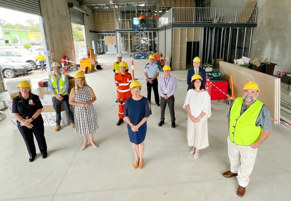 NEW DIGS: Politicians and SES members visit the new base at Redlands Business Park. Photo: supplied